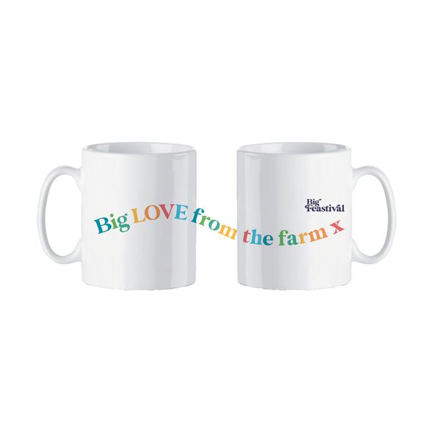 Two white ceramic Big Feastival mugs, featuring vibrant text reading Big LOVE from the farm x and The Big Feastival logo, are shown together to showcase both cheerful designs.