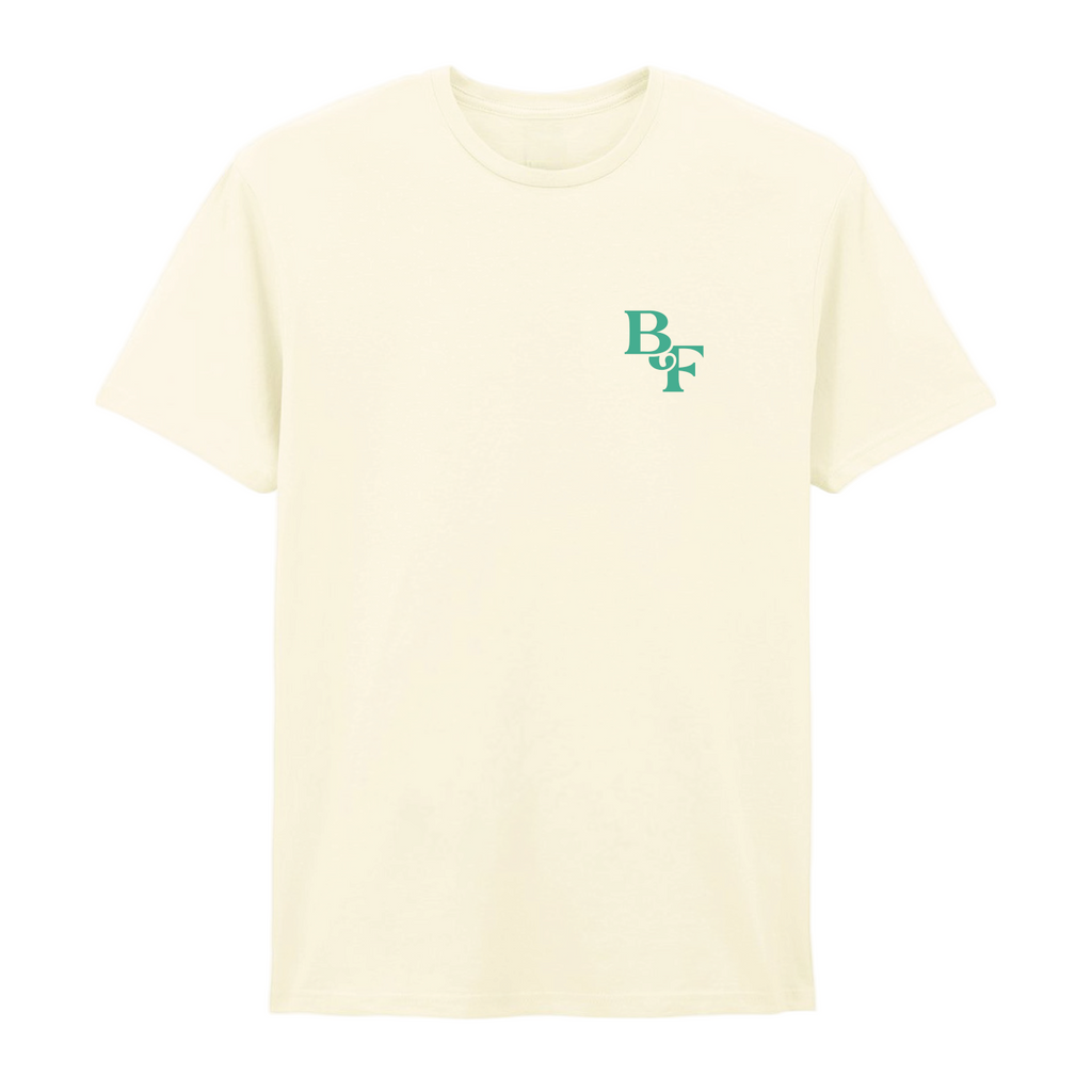 The Big Feastival 2025 Line Up T-Shirt Off White by 2025 features small green overlapping BDF letters on the left chest, shown on a white background.